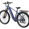 The Tarmac Ebike, shown in blue with rear cargo rack, fenders, disc brakes, and a handlebar-mounted display, is viewed from the side and slightly behind.