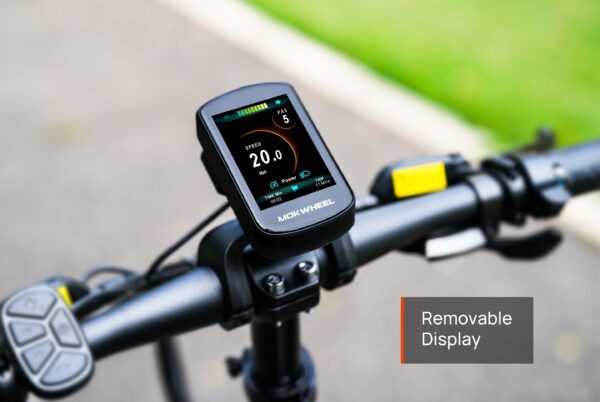 Close-up of the Slate Ebike display on the handlebars, showing speed, battery level, and pedal assist info, with a “Removable Display” label in the corner.