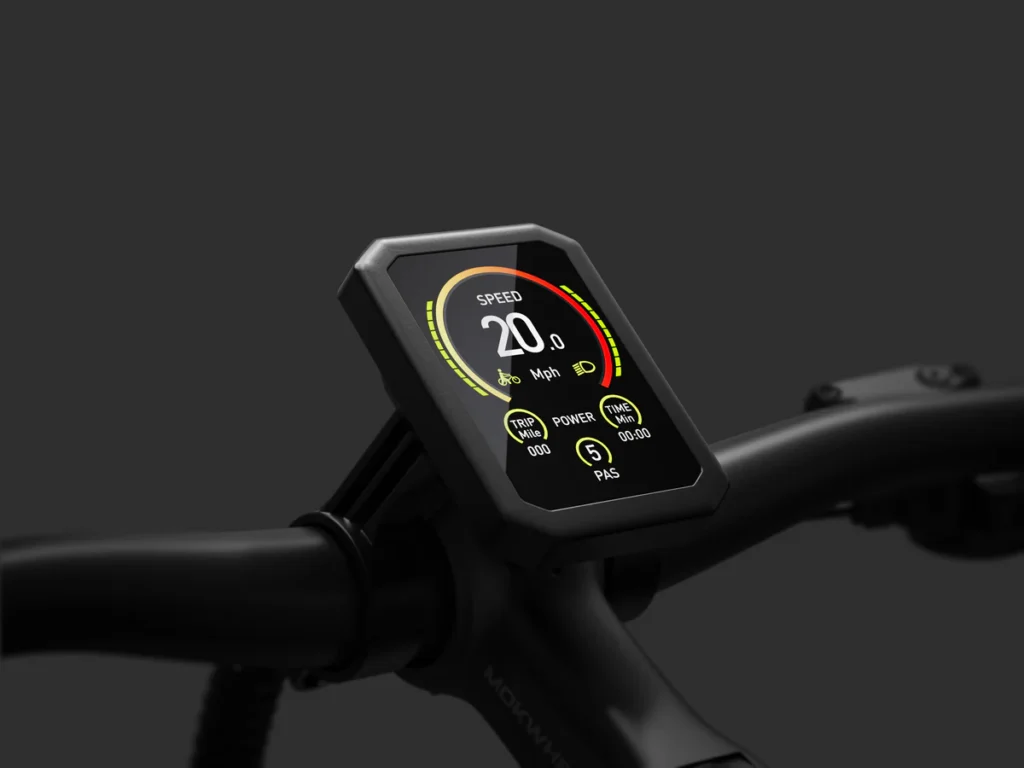 A digital display mounted on a bicycle handlebar shows speed at 20.0 mph along with power, PAS, and battery level indicators on a black background.