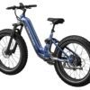 The Obsidian ST Ebike in blue features fat tires, a step-through frame, front suspension fork, rear rack mount, and a handlebar display, shown from a rear side view.