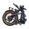 The Slate Ebike, a blue folding electric bicycle, is compactly folded to display its wheels, frame, pedals, and handlebars against a white background.