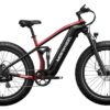 A black and red MOLWHEEL electric fat tire bike with a front suspension fork, disc brakes, and a central battery on the frame.