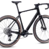 The CF Racer1, a black gravel bike with drop handlebars, disc brakes, and tan-walled tires, is shown on a white background.