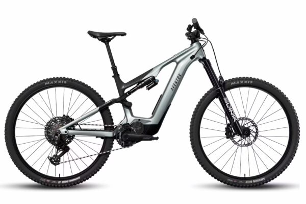 A modern full-suspension electric mountain bike with large knobby tires, a central motor, and disc brakes, viewed from the side against a white background.