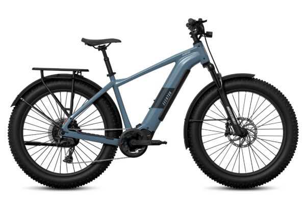 Aventon Aventure electric mountain bike in blue with fat tires, a rear rack, and a front suspension fork.