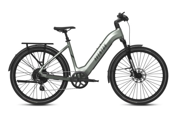 Aventon step-through electric commuter bike in sage green, featuring a rear rack, fenders, and disc brakes.