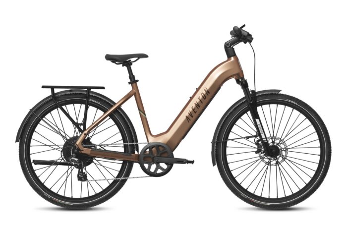 Aventon step-through electric commuter bike in copper, featuring a rear rack, fenders, and disc brakes.