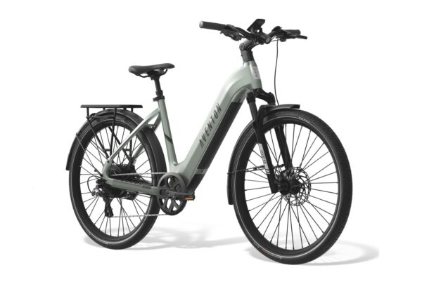 Light green Aventon step-through electric commuter bike with a rear rack, fenders, and disc brakes.