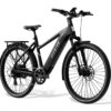 Matte black Aventon electric commuter bike with a rear rack, fenders, and disc brakes.