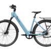 Light blue Mokwheel electric commuter bike with a step-through frame, fenders, and a rear rack.