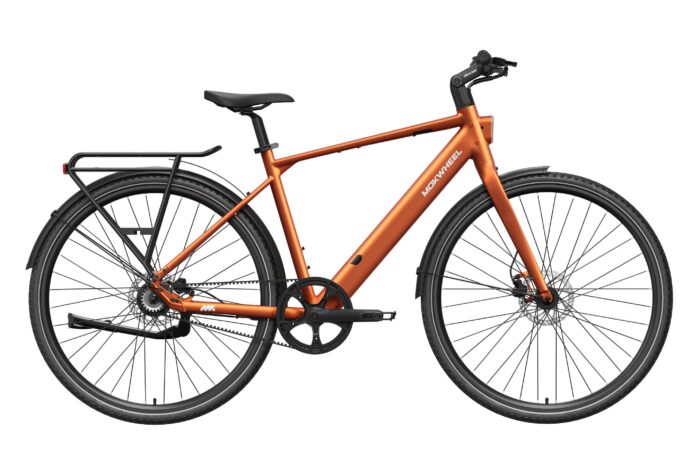 Orange Mokwheel electric commuter bike with a rear rack, fenders, and belt drive.