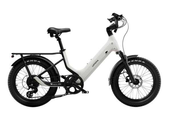 White Urtopia electric step-through bike with a rear rack and thick, knobby tires.
