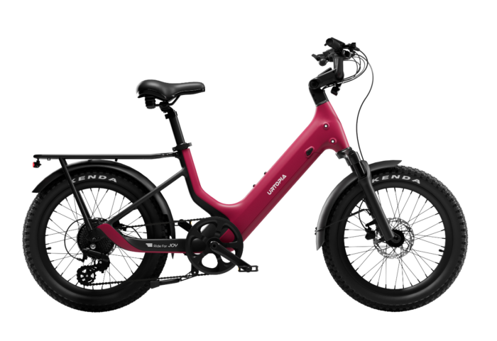 Magenta Urtopia step-through electric bike with a rear rack and knobby tires.