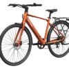 Orange Mokwheel electric commuter bike with a rear cargo rack and integrated front light.