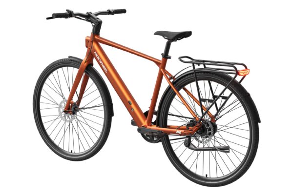 Copper-colored Mokwheel electric commuter bike with a rear rack, fenders, and disc brakes.