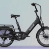 Black Aventon Abound electric cargo bike with a rear rack, step-through frame, and small wheels.