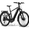 Matte black Aventon electric commuter bike with a rear cargo rack and fenders.