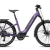Purple Aventon step-through electric commuter bike with a rear rack, fenders, and disc brakes.