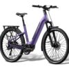 Purple Aventon electric step-through bicycle with a rear rack, fenders, and front suspension.