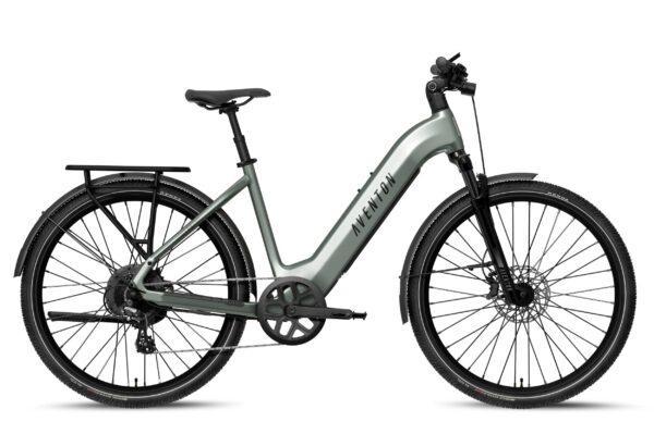 Sage green Aventon step-through electric bike with a rear rack, fenders, and disc brakes.