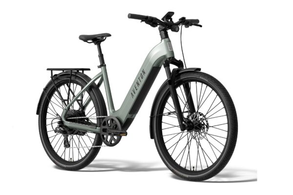 Light green Aventon electric step-through bicycle with a rear rack, fenders, and black tires.