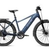 Dark blue Aventon step-through electric bike with a rear rack, fenders, and disc brakes.