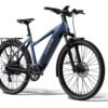 Aventon step-through electric commuter bike in matte blue with a rear rack, fenders, and disc brakes.