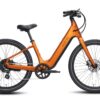 Orange Aventon Pace electric commuter bike with a step-through frame.