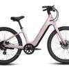Light pink Aventon step-through electric bicycle on a white background.
