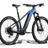 Blue Aventon electric mountain bike with knobby tires and a front suspension fork.
