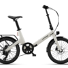 Off-white Urtopia folding electric bike with black components, a rear rack, and disc brakes.