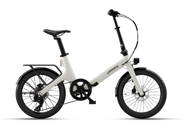 Off-white Urtopia folding electric bike with black components, a rear rack, and disc brakes.