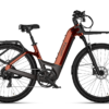 Urtopia electric bike with a step-through frame, front and rear cargo racks, and knobby tires.