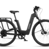 Matte black Urtopia electric step-through bicycle with a rear rack and knobby tires.