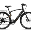 Urtopia carbon fiber e-bike in matte black with orange accents, a rear cargo rack, and disc brakes.