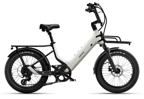 White Urtopia step-through electric bike with front and rear racks and knobby tires.