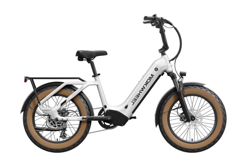 White WOKWHEEL step-through electric bike with fat tires, a rear rack, and front suspension.