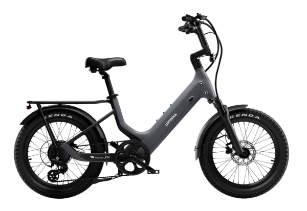 Gray Urtopia step-through electric bike with a rear rack and knobby tires.